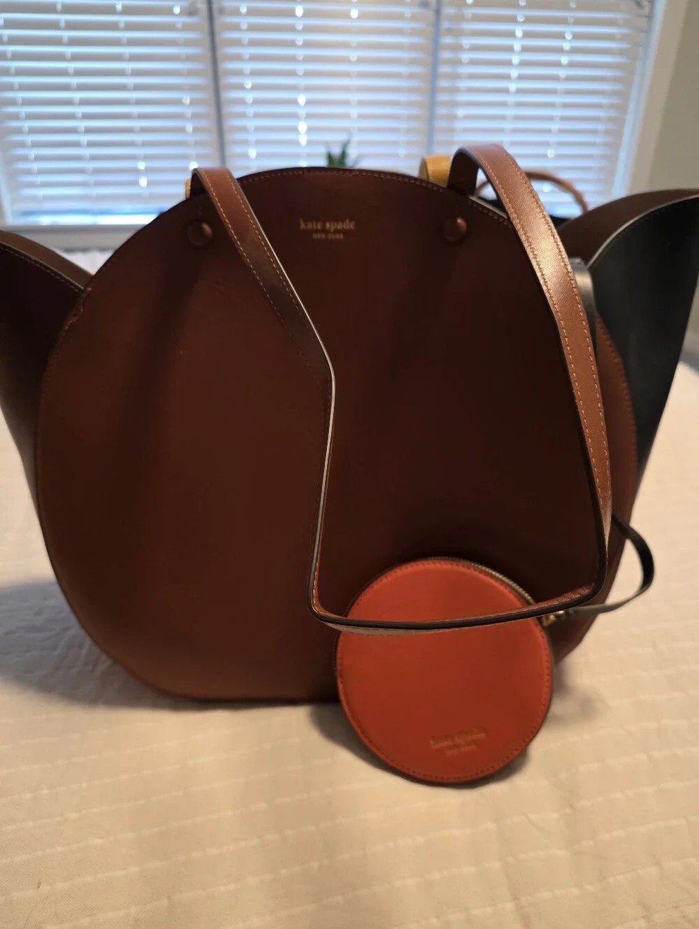 kate spade brown leather round shoulder bag with orange coin pouch